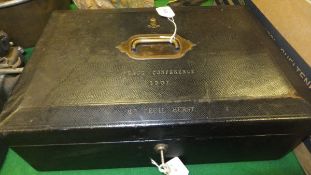 A black leather bound box with brass handle to top, stamped "Peace Conference 1907 Mr Cecil Hurst"