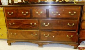 An early 19th century mahogany chest of two long and one short drawer over two banks of two