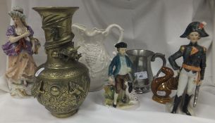 Three Continental porcelain figurines to include one titled "Marechal de L'empire", an Oriental