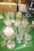 Two glass decanters, one square bodied glass decanter, a cut glass jug, one other jug, glass bowl,