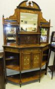 An Edwardian rosewood and inlaid mirror back sideboard, the mirrored superstructure with various