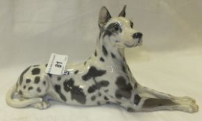 A Royal Copenhagen figure of a spotted Great Dane, seated, No'd. 1679   CONDITION REPORTS  General