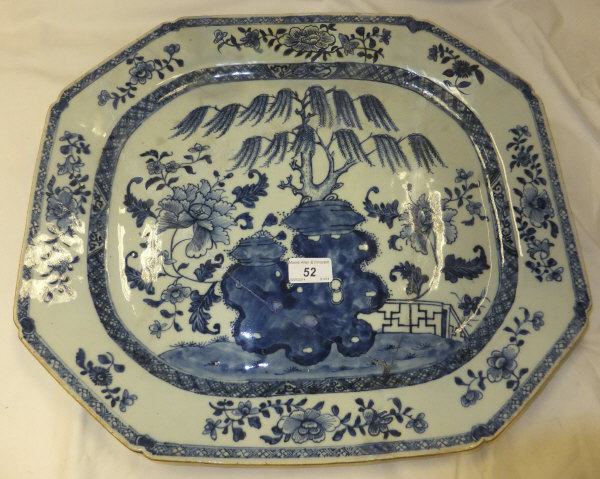 A 19th Century Chinese porcelain meat plate painted in underglaze blue with rock, willow, flowers