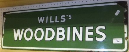 A Wills Woodbines enamelled sign
