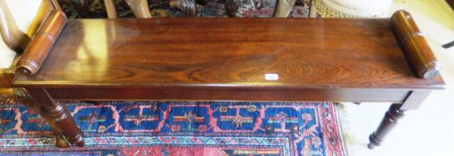 A rosewood window seat in the 19th century manner