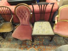 A Victorian mahogany framed spoon back salon chair on cabriole front legs to scroll feet and