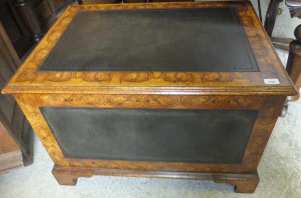 A walnut oyster veneered coffee table/trunk   CONDITION REPORTS  Has general wear, knocks,