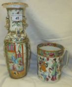 A 19th Century Chinese porcelain vase decorated in the famille-rose palette with panels depicting