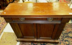 A Victorian mahogany chiffonier with single drawer over two panelled cupboard doors to plinth