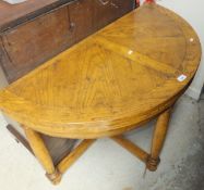 A modern oak Credence style fold over table in the 17th Century manner