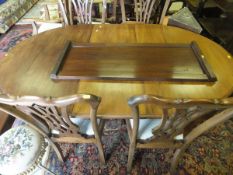 A late 19th century oval draw leaf dining table, with two extra leaves, on cabriole legs to claw and