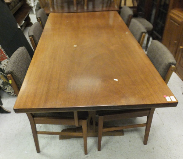 A set of six 1970's teak framed boardroom chairs by Gordon Russell of Broadway and a mid 20th