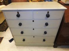 A painted pine chest of two short and three long drawers