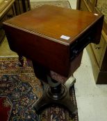 A Victorian mahogany drop leaf Pembroke style work table with single drawer and work basket raised