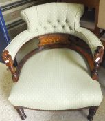 A pair of Edwardian rosewood and inlaid salon tub chairs with pale green upholstered back and seat