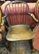 A 19th Century oak and elm stick back elbow chair   CONDITION REPORTS  Hole with what appears to