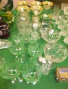 Six green glass wine glasses etched with leaf decoration, other assorted drinking vessels, glass