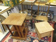 A pair of 19th Century oak and elm stick back chairs with plank seats, a pine box commode, a