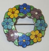 An early 20th century silver brooch with enamelled flower head decoration (by D & S, Birmingham