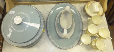 A Royal Doulton "Aegean" pattern part dinner service comprising six dinner plates, oval platter,