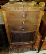 An early 19th century mahogany wash stand, the double rising lid opening to reveal bowl recess above