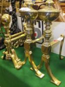 Two pairs of brass fire dogs, and four cast irons   CONDITION REPORTS  Brass is rubbed on the top of