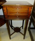 A 19th century mahogany wash stand, the plain top with moulded edge above two drawers on square