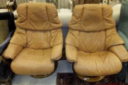 Two Ekornes (Norwegian) upholstered swivel armchairs   CONDITION REPORTS  Both of the chairs with
