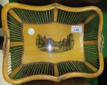 A Mauchline ware basket with central panel showing street scene, labelled "Waterloo Place