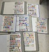 Fourteen folios containing various mainly 20th Century stamps of the world