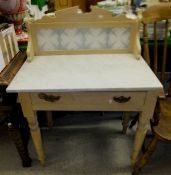 A tile back marble top wash stand