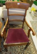 A Victorian mahogany bar back carver chair with drop-in seat