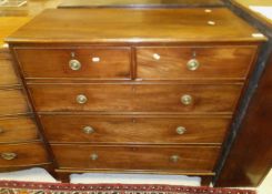 A Victorian mahogany chest of two short and three long drawers on bracket feet