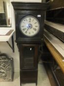 An American drop dial wall clock in oak case (factory clock conversion)