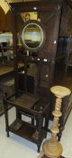 An early 20th Century oak hall stand, and a beech pedestal plant stand