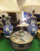 A pair of modern blue and white table lamps in the form of Chinese vases with elephant head handles,