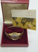 An Omega gold plated wristwatch, together with box and original guarantee   CONDITION REPORTS  Light