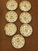 A set of seven 19th Century chinese plates bearing marks to base with polychrome decoration of moths