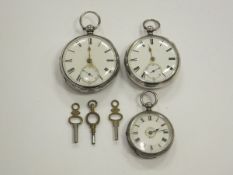 A collection of three silver cased pocket watches, the white enamel dials set with Roman numerals,