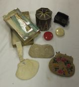 A box containing three mid 20th Century evening bags, an Addis dressing table set, two plastic boxes