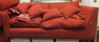A large red ground corner sofa