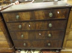A 19th Century mahogany chest of two short and three long drawers on turned legs