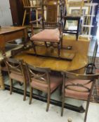A 20th Century mahogany D end table with six chairs, together with an Edwardian elbow chair