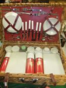 A Sirram picnic hamper, fitted, a Sanyo cine camera, leather briefcase, mahogany box and contents of