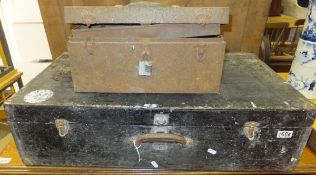A painted wooden carpenter's tool box containing various hand tools to include saws, set square,