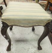 A mahogany framed stool with striped upholstered seat