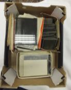 A box containing a quantity of 19th Century and later glass negatives of topographical scenes