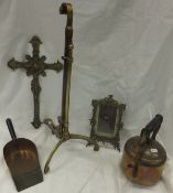 Three electric copper kettles, a brass easel, two copper coal shovels, brass figure of Jesus on
