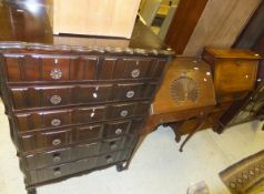 An oak single drawer bureau, a mahogany single drawer bureau with carved shell motif to the fall