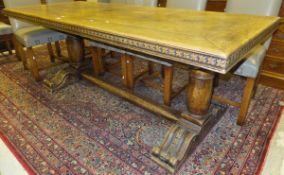 A 20th Century walnut refectory style dining table in the 17th Century manner